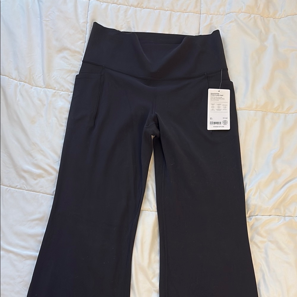 Athleta salutation stash flare pant black size large